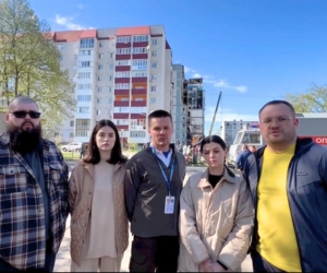 Uman Humanitarian Center team near the destroyed building in Uman